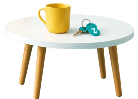 White table with yellow mug and keys